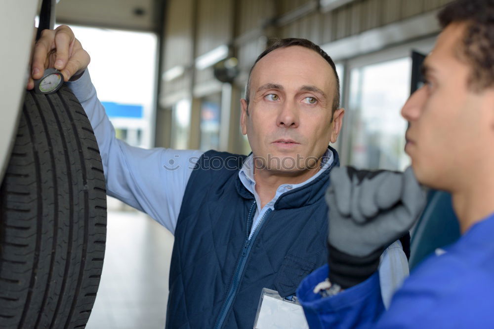 Similar – Professional Car Mechanic working.