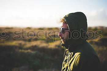 Similar – Tourist with camera on field