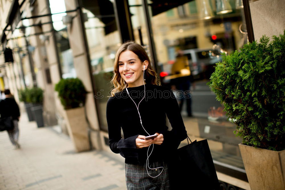 Similar – Image, Stock Photo Portrait of young woman smiling in urban background