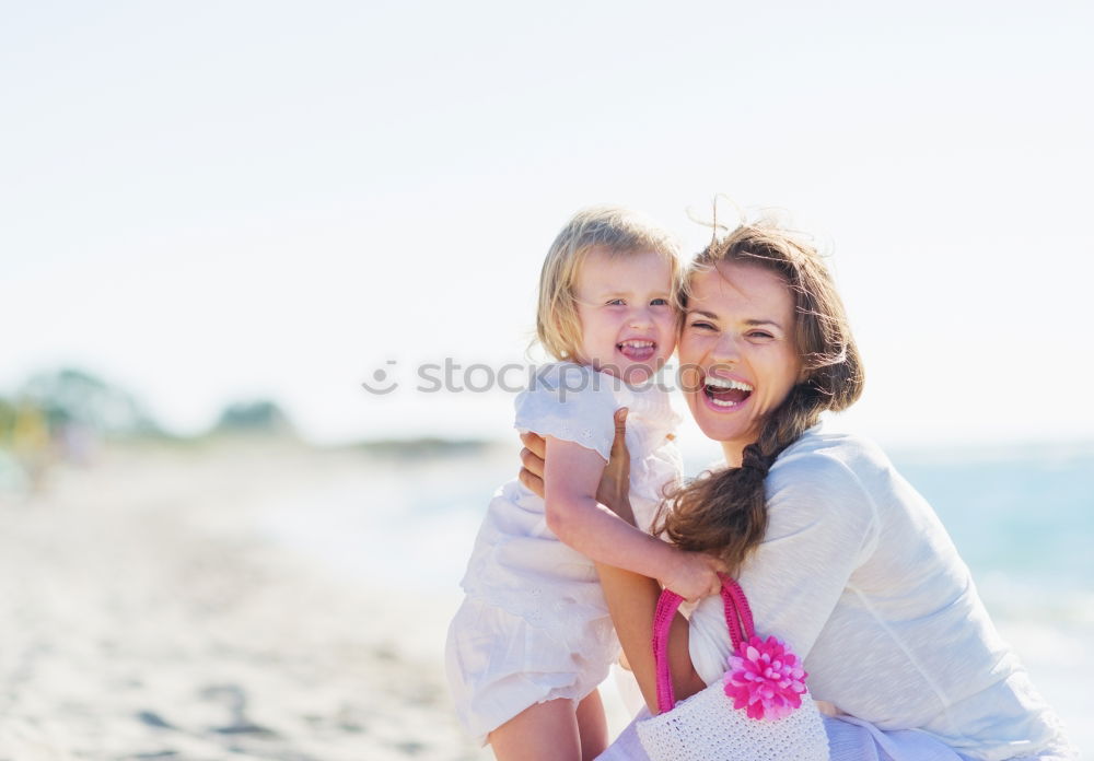 Similar – Sister and brother playing on the beach