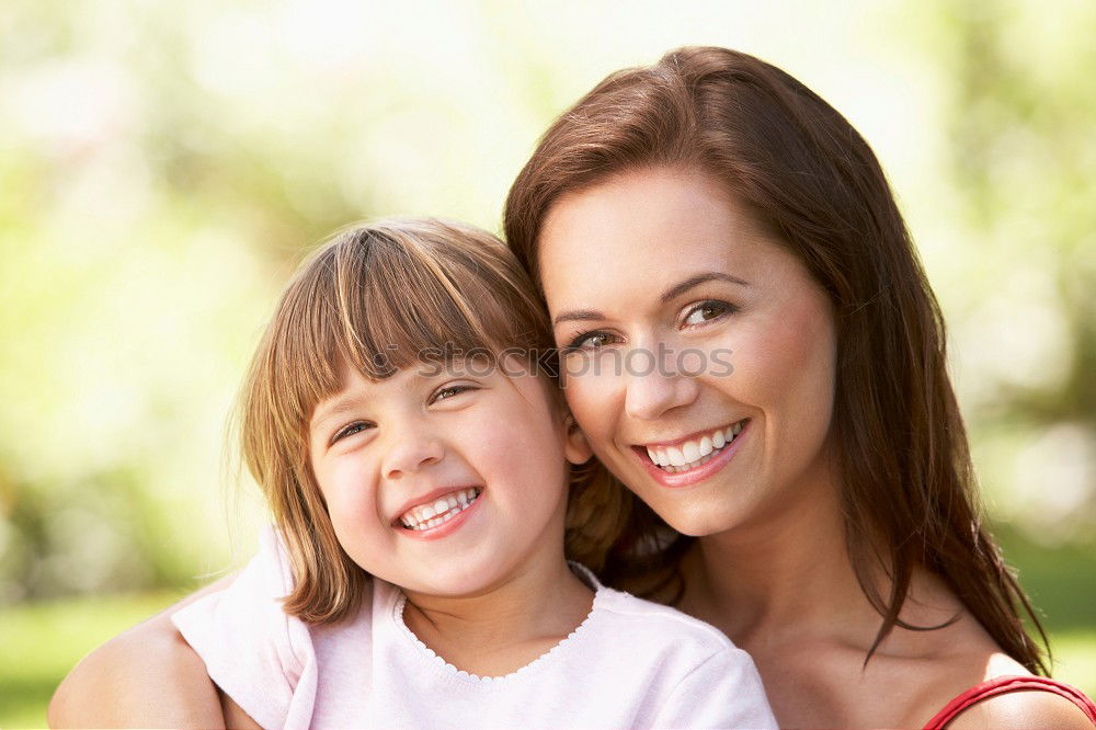 Similar – Image, Stock Photo Mother and son seated on a park