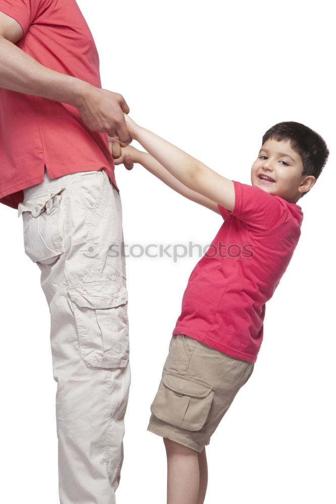 Similar – sad son hugging his dad near wall at the day time