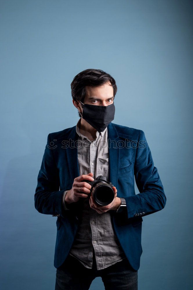 Similar – Image, Stock Photo Young man wearing winter clothes standing in the street