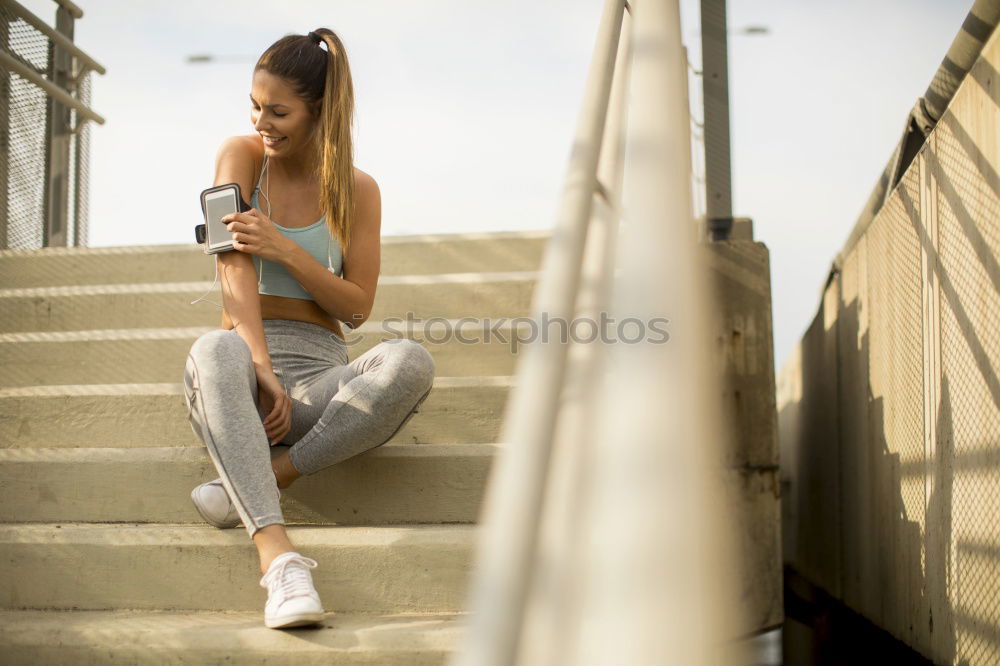 Similar – Image, Stock Photo African woman listening to music with earphones and smart phone