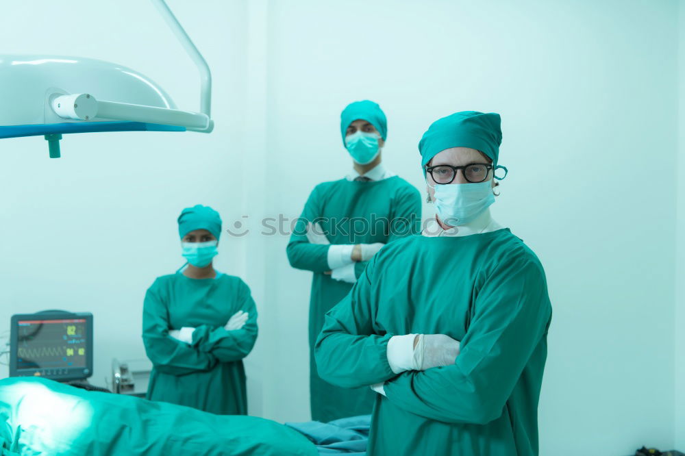 Similar – Image, Stock Photo Team of Surgeons Operating.