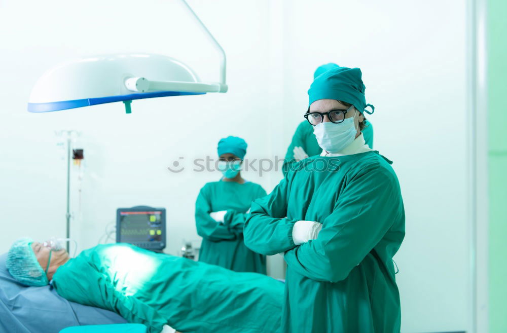 Similar – Image, Stock Photo Team of Surgeons Operating.
