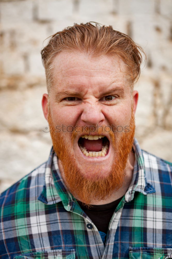 Similar – Portrait of a hipster guy putting silly face