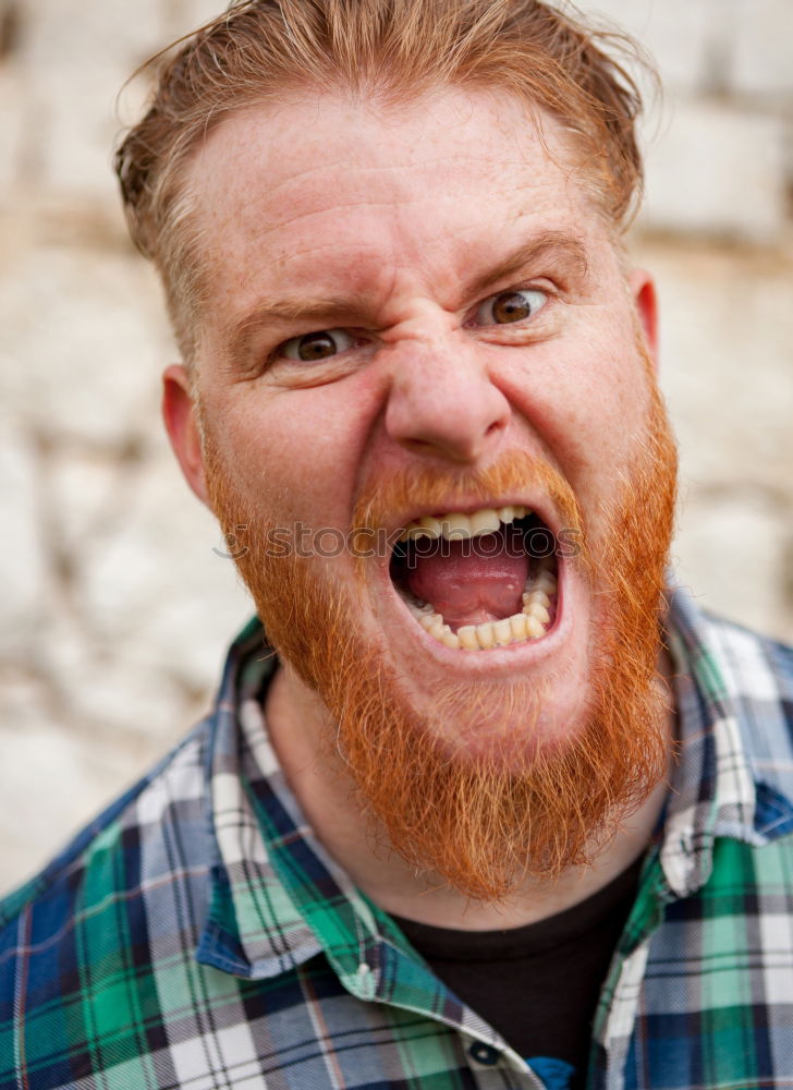 Similar – Portrait of a hipster guy putting silly face