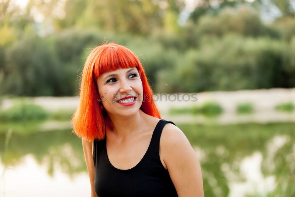 Similar – Image, Stock Photo Red haired woman relaxed in the park