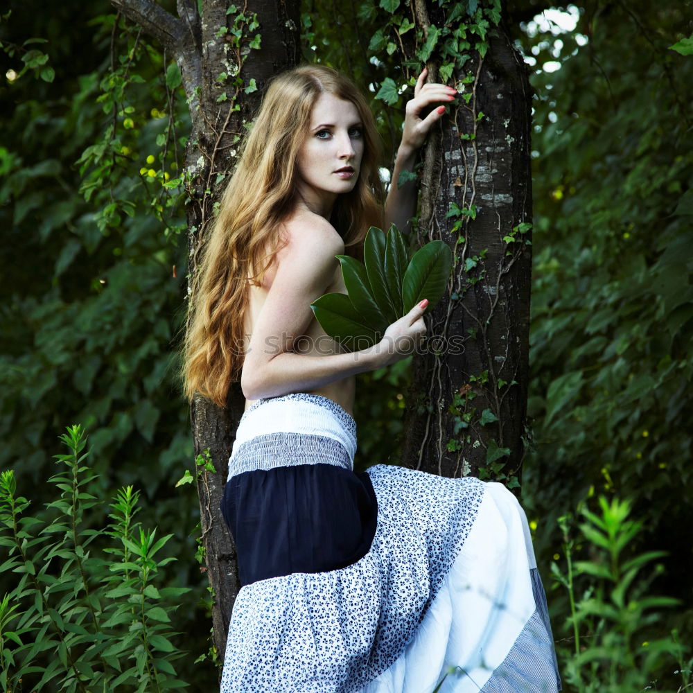 Similar – Image, Stock Photo Young, very athletic woman in skirt and t-shirt sits barefoot on a wooden bench in the forest with her legs crossed