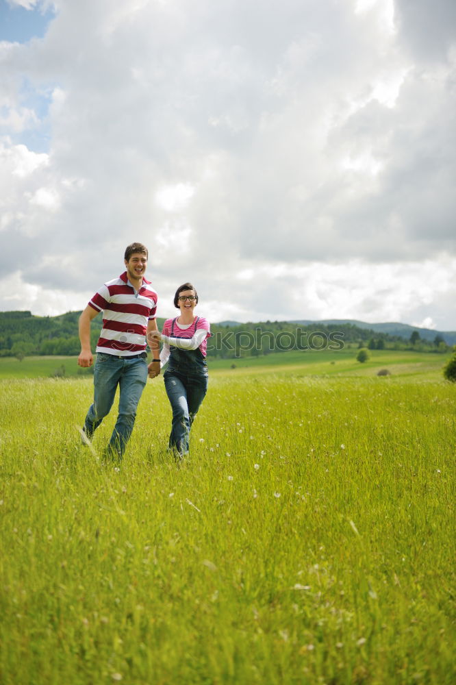 Similar – Senior couple in a meadow