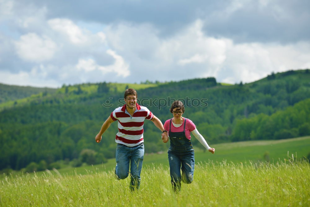 Similar – happy lovers on Holiday in the alps mountains