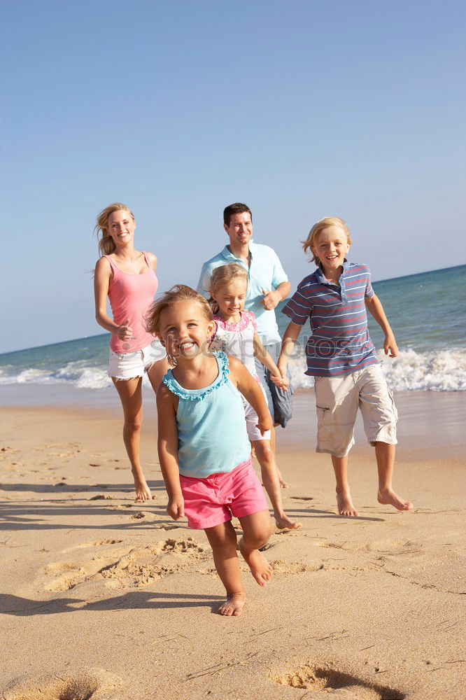 Similar – Two sisters and brother playing on the beach at the day time. Concept Brother And Sister Together Forever