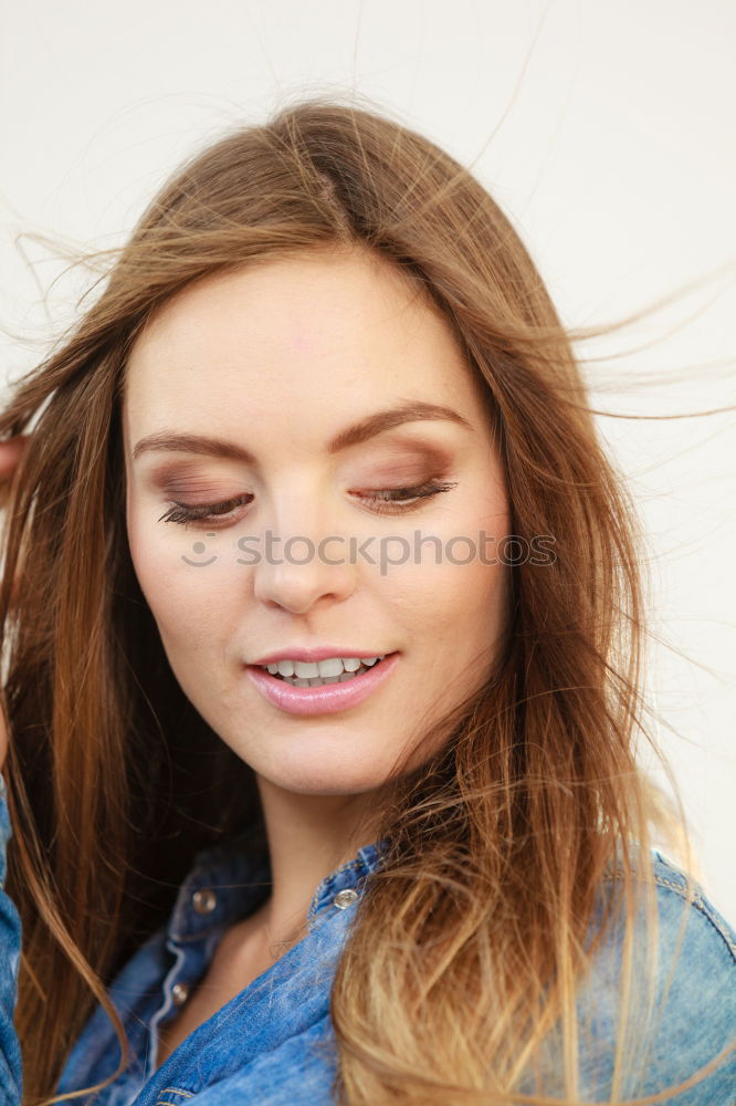 Similar – Woman with tongue out looking at camera