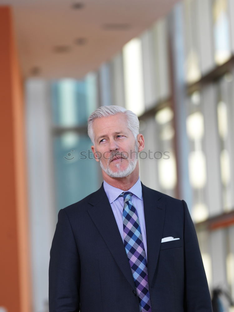 Similar – Senior businessman outside of modern office building.