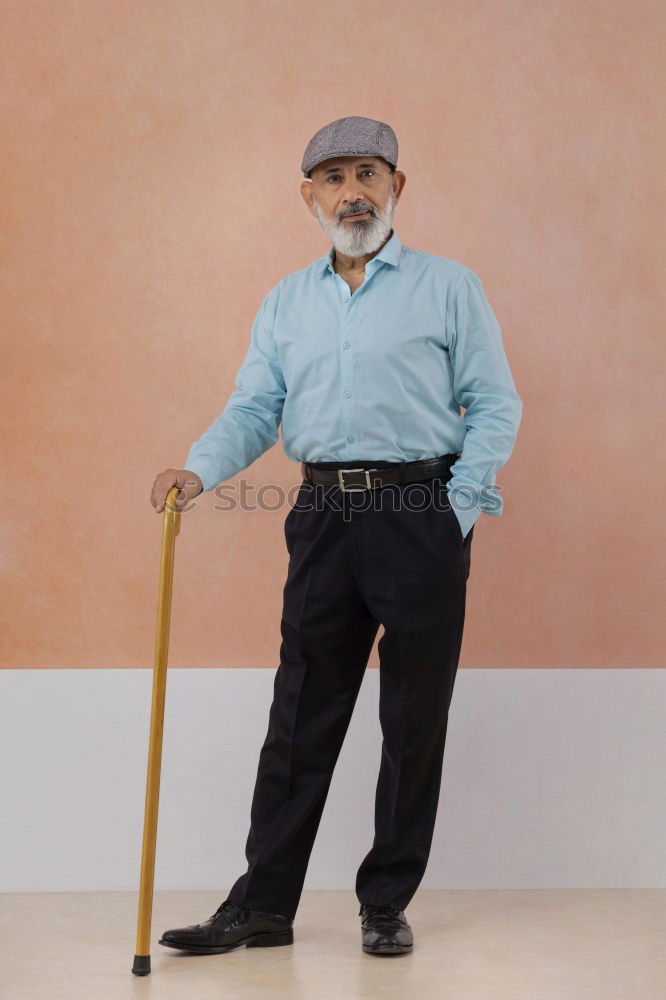 Similar – Image, Stock Photo Mature man sitting on steps in the street.