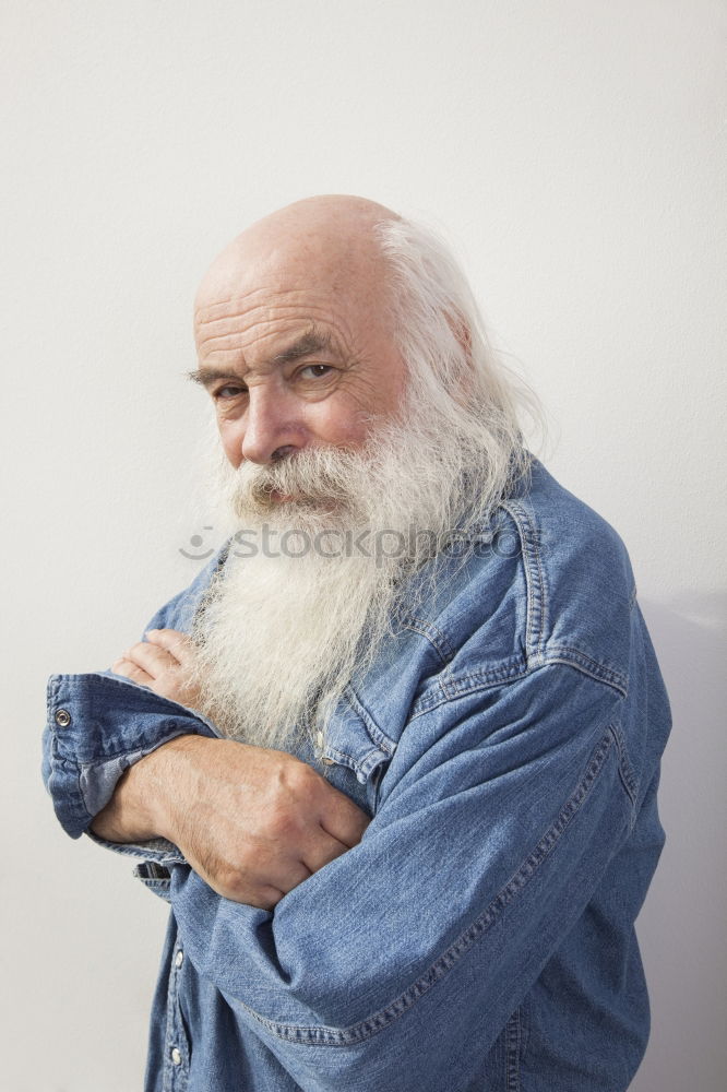 Similar – Image, Stock Photo Cheerful old man with grey hair and long beard looking at camera