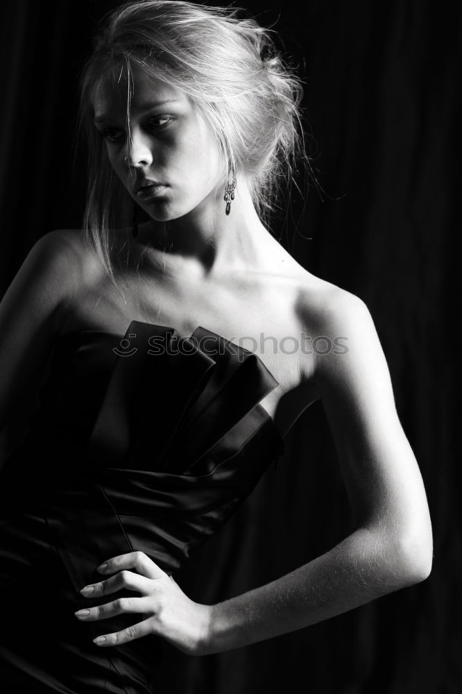 Fashion young girl with white dress and black necklace