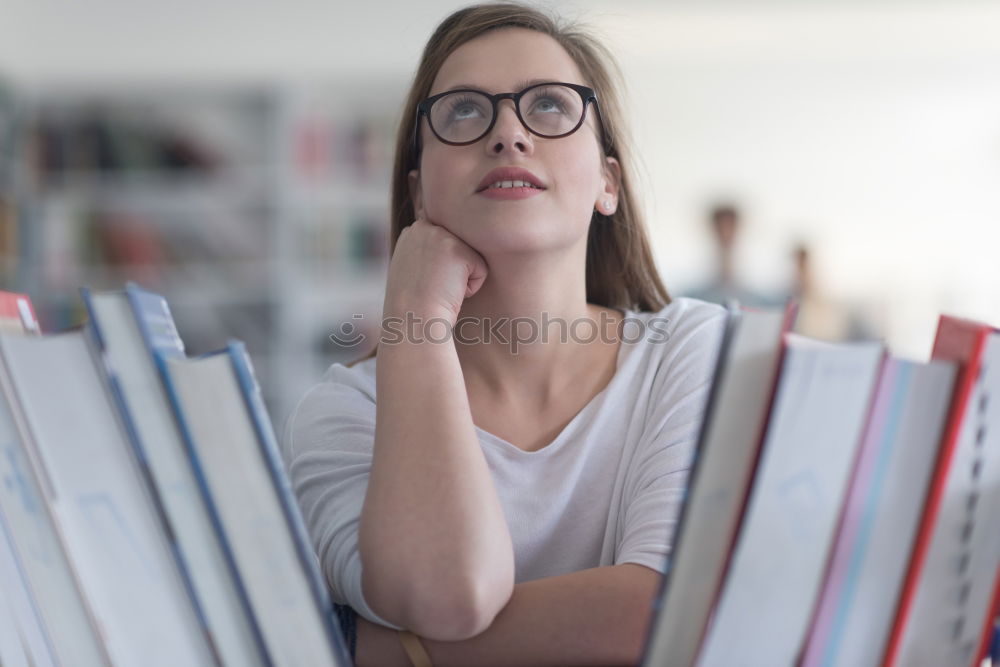 Similar – woman reading a book