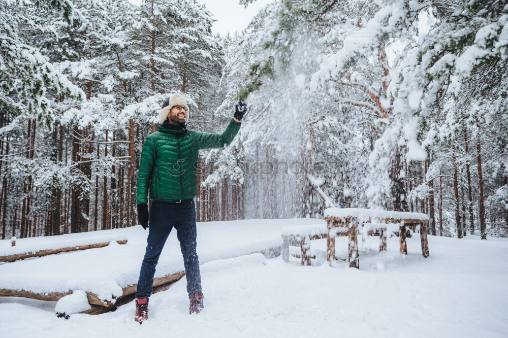 Similar – Image, Stock Photo Cheerful woman having fun in winter forest