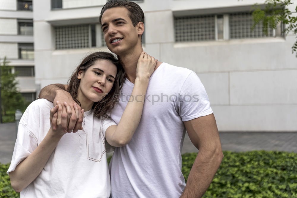 Similar – Young beautiful couple posing wearing jeans and t-shirt