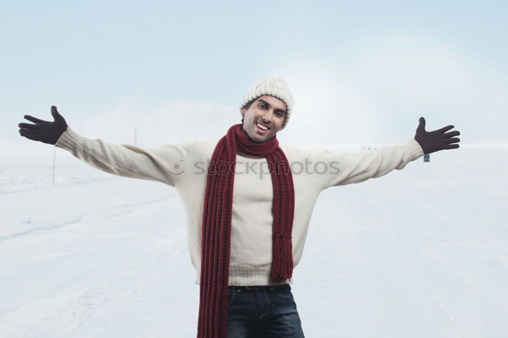 Similar – Image, Stock Photo Young and attractive man enjoying a snowy winter day