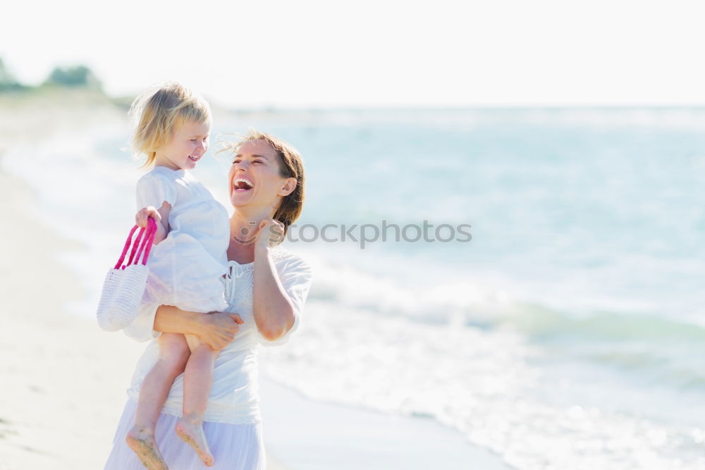 Similar – Sister and brother playing on the beach