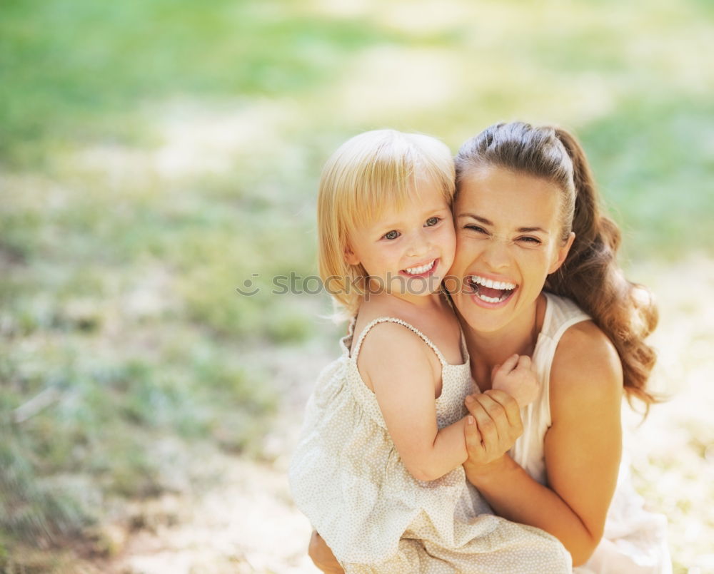 Similar – Happy mother and daughter playing in the park at the day time. Concept of celebration Mothers day .