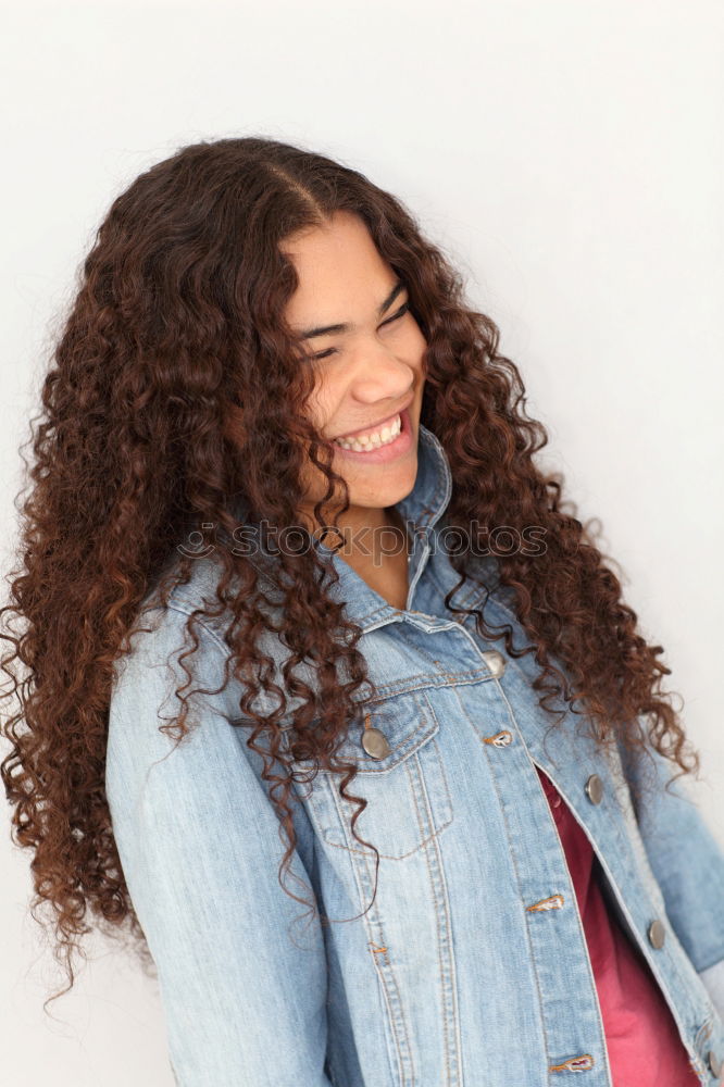 Image, Stock Photo Young black woman smiling and looking at camera