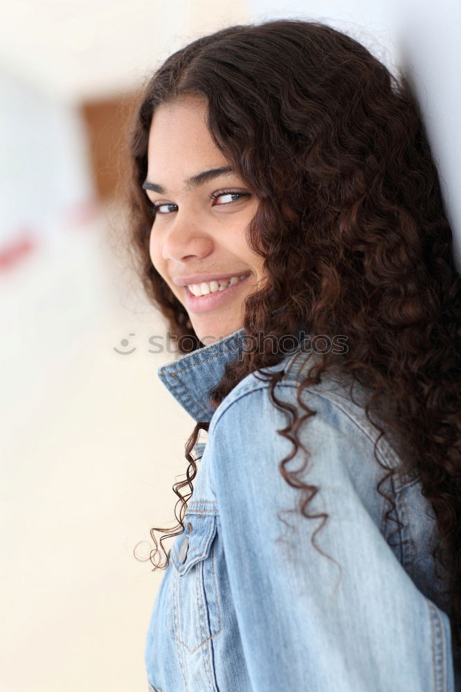 Similar – Image, Stock Photo Young black woman smiling and looking at camera