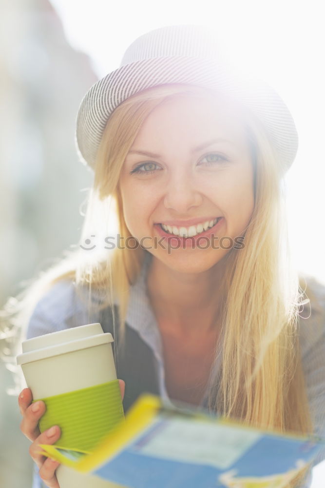 Similar – Woman posing sitting in outside cafe