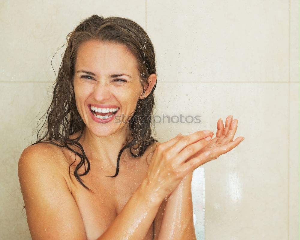 Similar – Attractive woman washing her hair in the shower