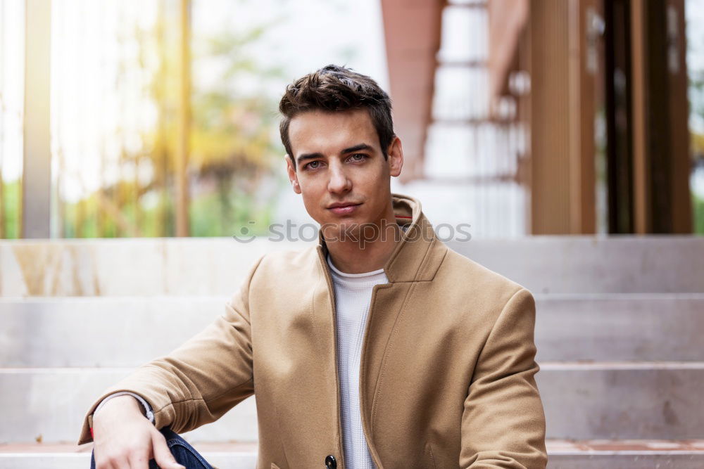 Similar – Image, Stock Photo Young man wearing winter clothes in the street sitting