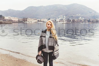 Similar – Young dreamy woman at seaside