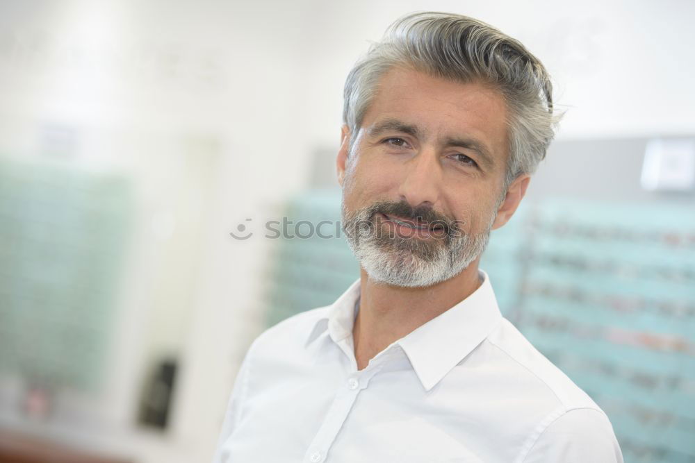 Similar – Senior businessman outside of modern office building.