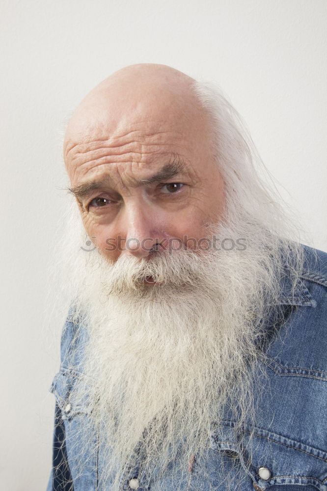 Similar – Image, Stock Photo Cheerful old man with grey hair and long beard looking at camera