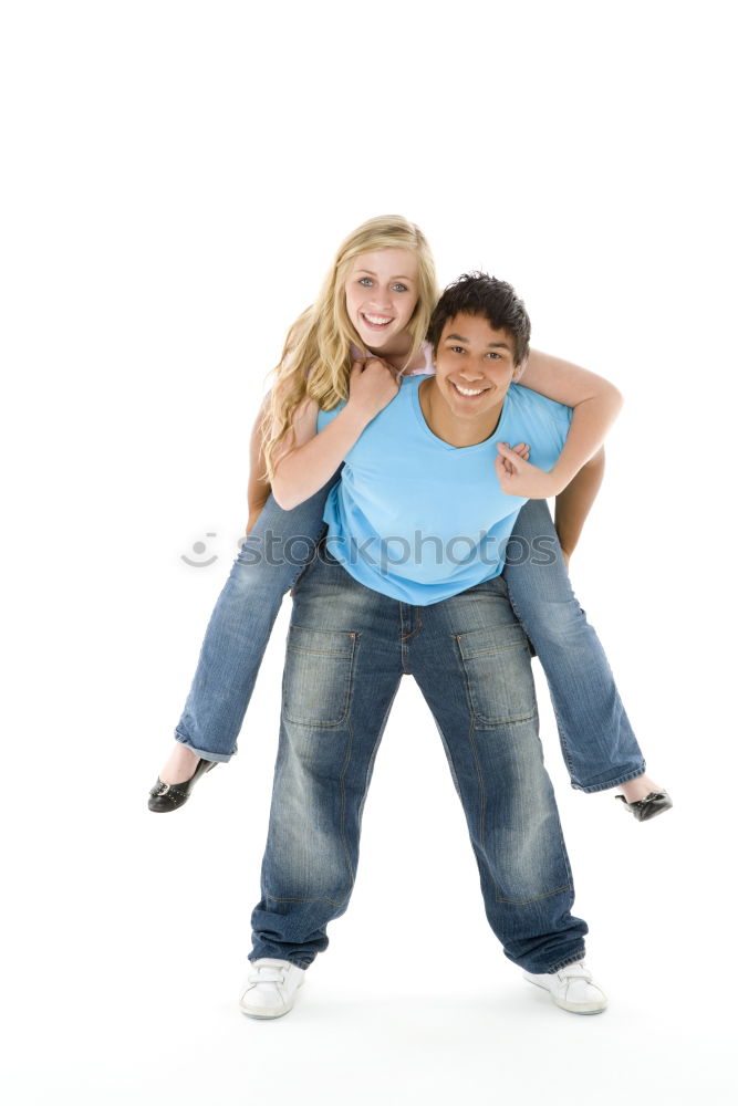 Similar – Couple in Fitness Attire Ready for Outdoor Workout