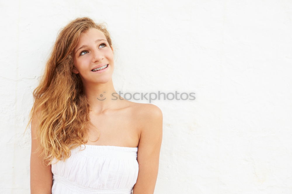 Similar – Smiling young woman in urban background.