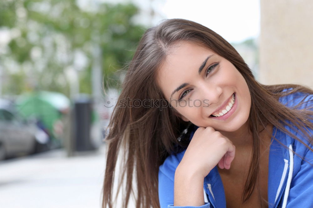 Similar – Beautiful young caucasian woman smiling outdoors