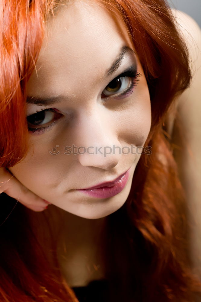 Similar – young woman with red hair and light eyes