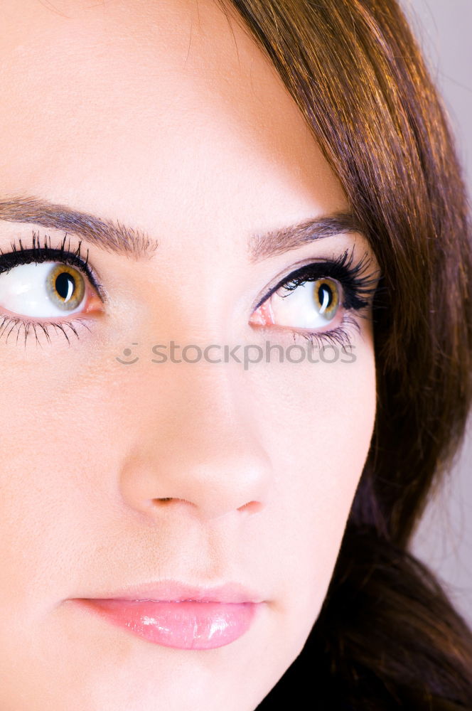 Similar – Portrait of a beautiful young caucasian tanned girl on a white background closeup. Long eyelash and natural brown eyebrows, green eye, beauty concept