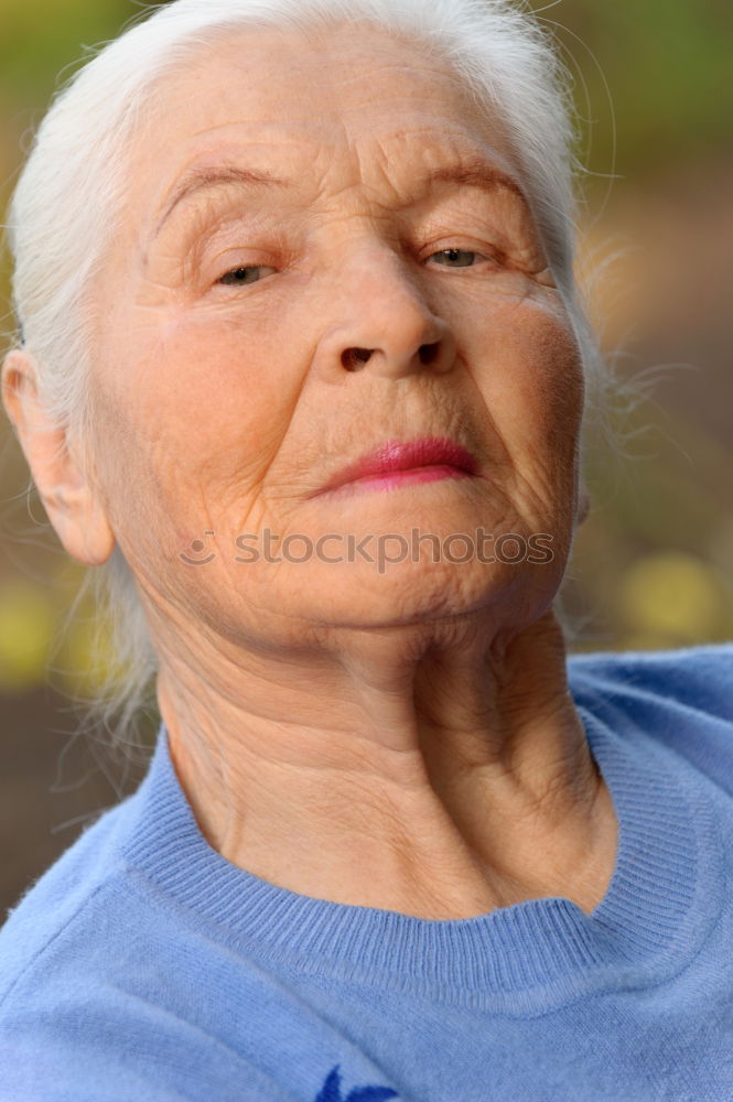 Similar – older woman looking pleased