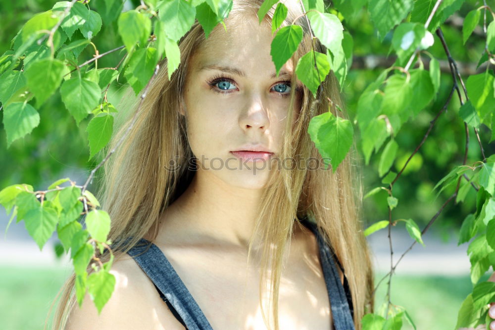 Pretty happy woman with red long hair