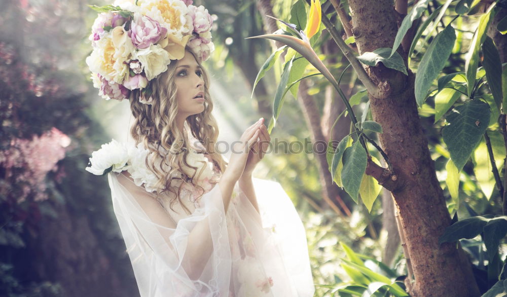 Similar – Happy young black woman surrounded by flowers