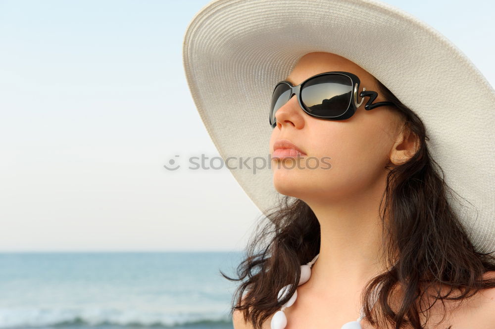 Similar – Redhead model protecting herself from sun