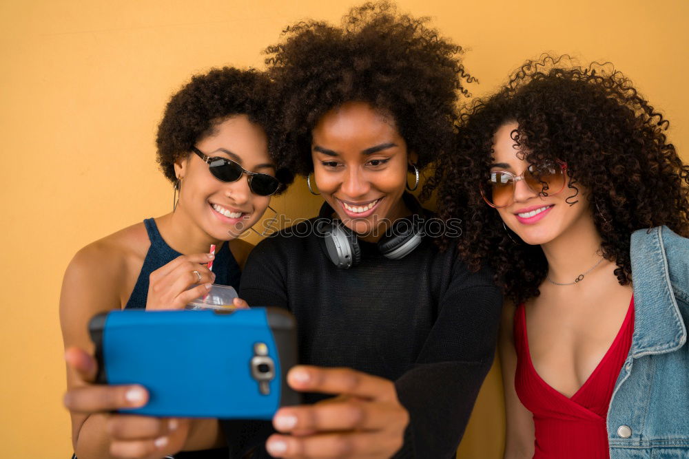 Similar – Image, Stock Photo Women taking selfie in studio