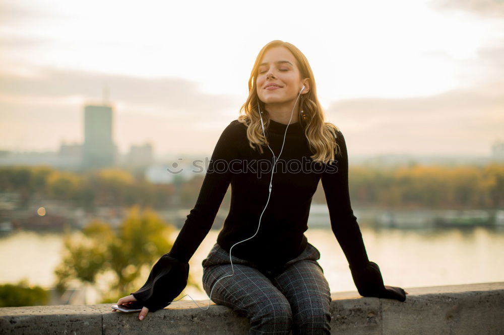 Similar – Young woman standing in the river Rhine