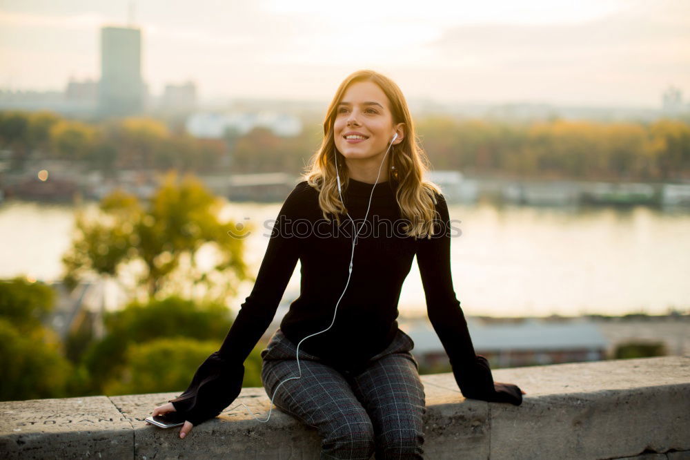 Similar – Young woman standing in the river Rhine