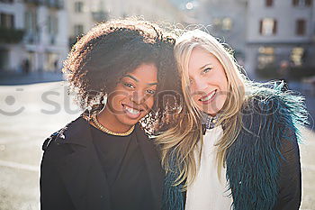 Similar – Image, Stock Photo Cheerful women posing at fence