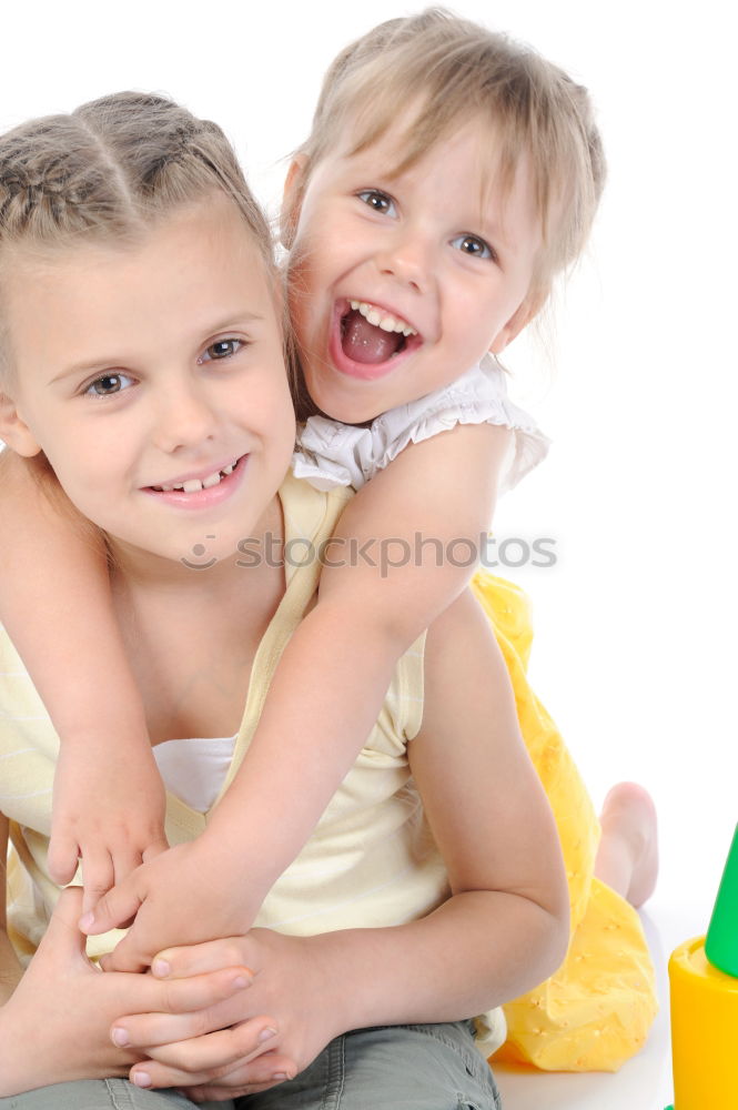 Similar – Image, Stock Photo two beautiful sisters playing at home